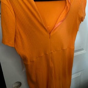 Orange zip up romper